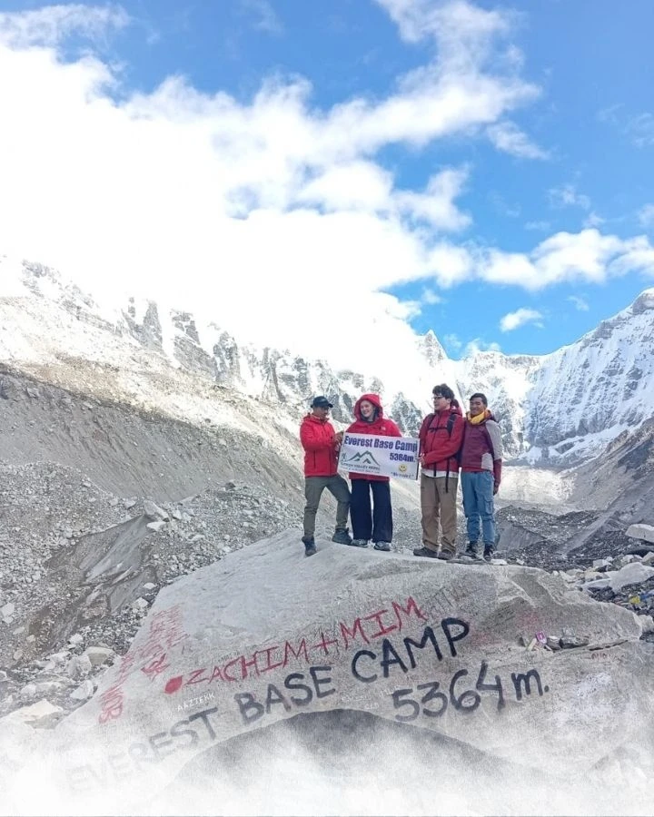 Standing on the Everest Base Camp Rock