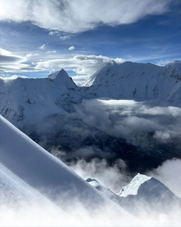 Peaks Rising Through the Clouds