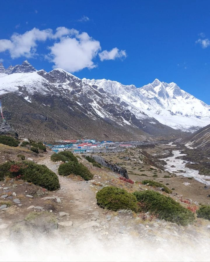 A Village Beneath the Giants