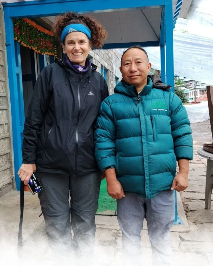 Lynn and Guide Raj at the Lodge