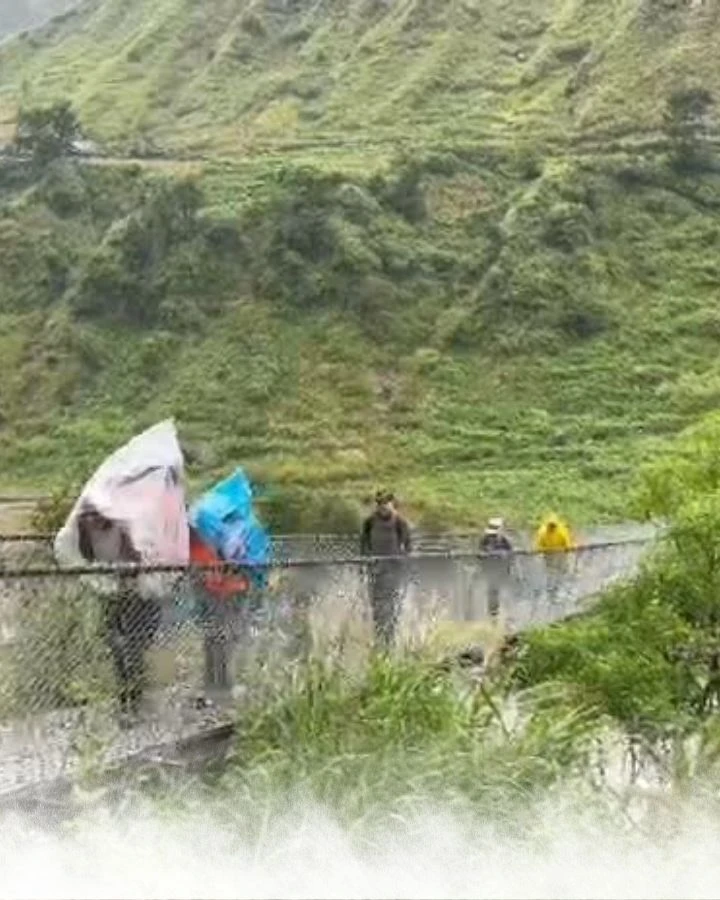 Crossing the Bridge in the Rain
